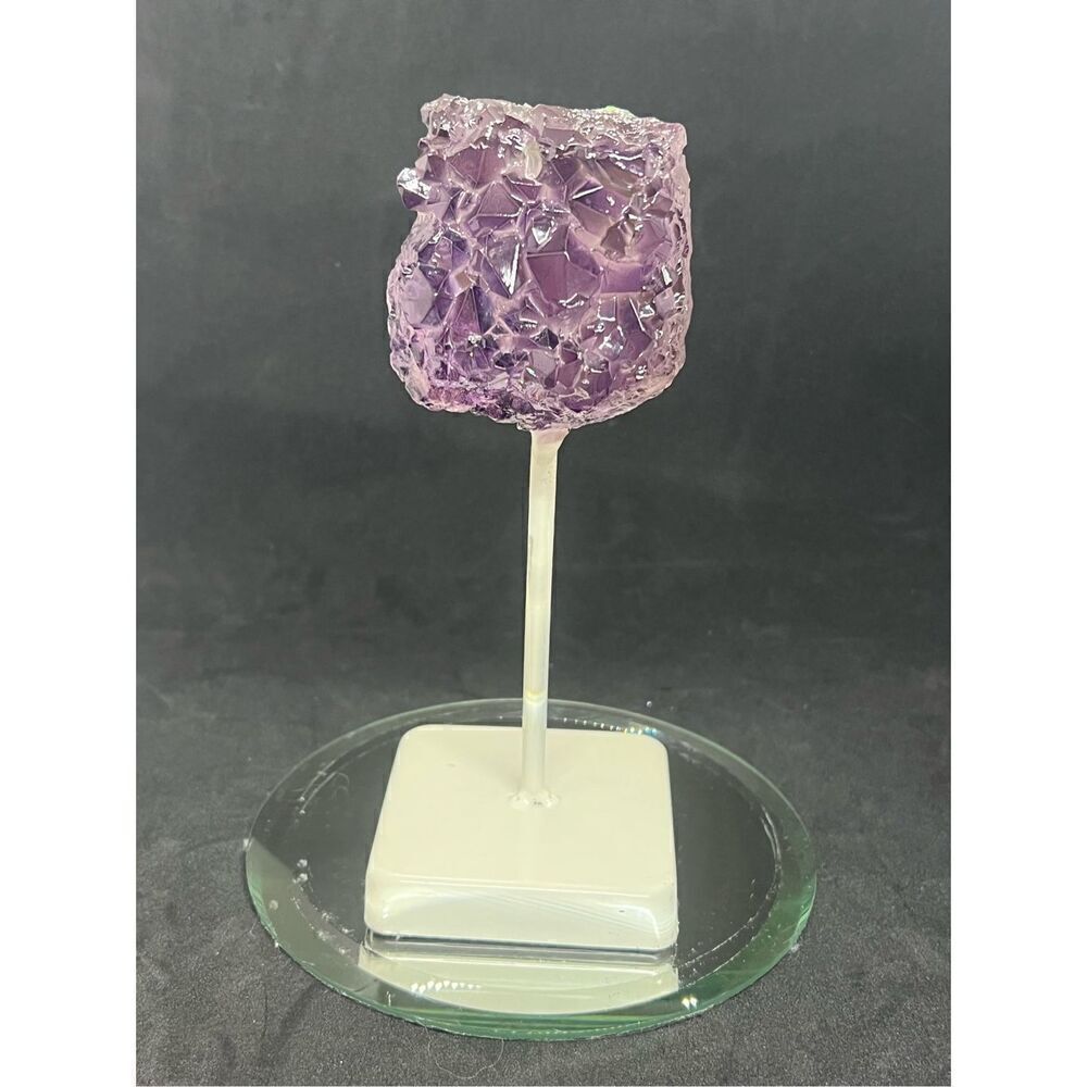 Amethyst Geode On fixed White metal stand 7.5” Tall 3” Wide